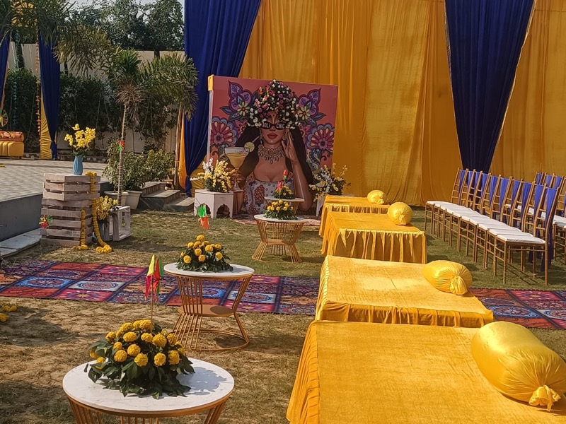Vibrant haldi event decoration with marigold flowers